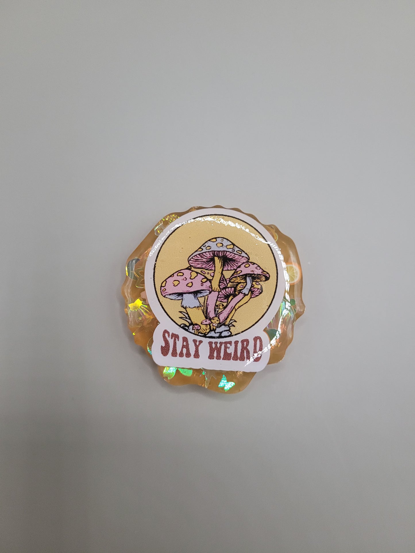 Stay Weird Badge Face